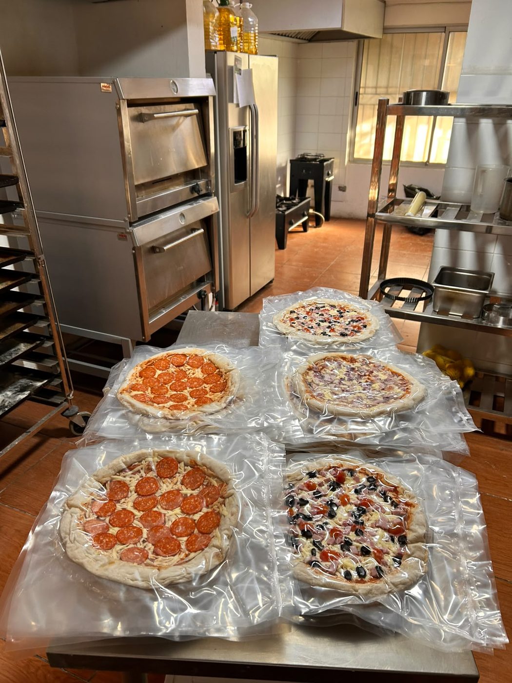 Pizzas Doca's selladas al vacío listas para despacho